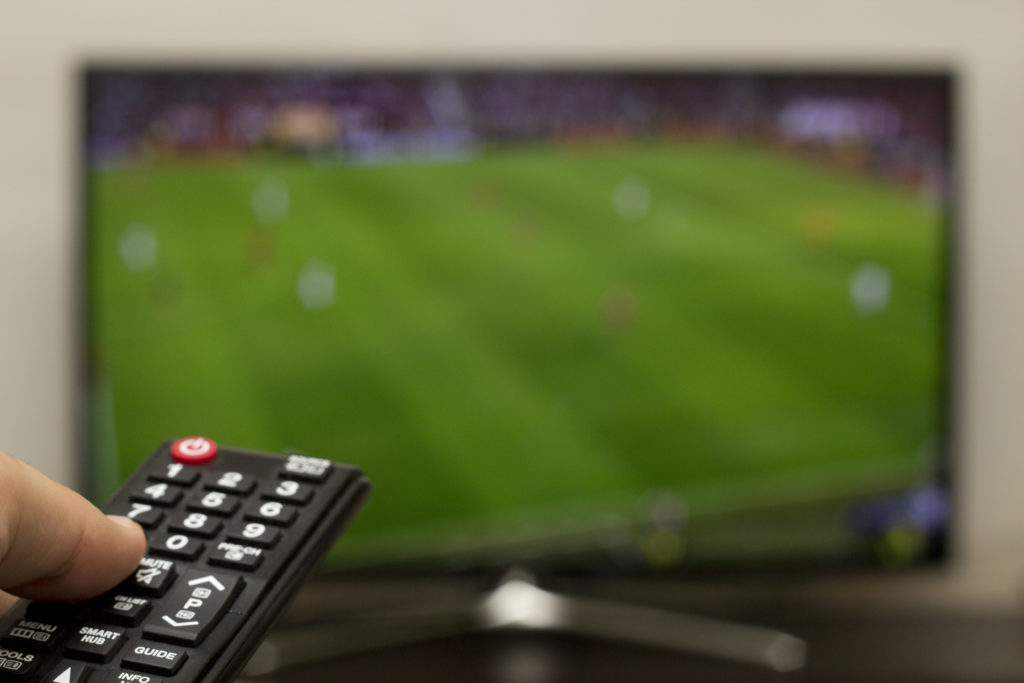Remote and Soccer game on TV
